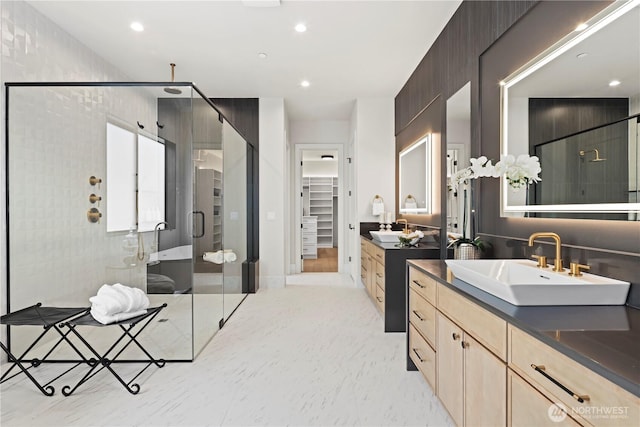 5515 108th Ave NE, Kirkland, WA 98033 - bathroom with a shower stall, two vanities, a spacious closet, and recessed lighting