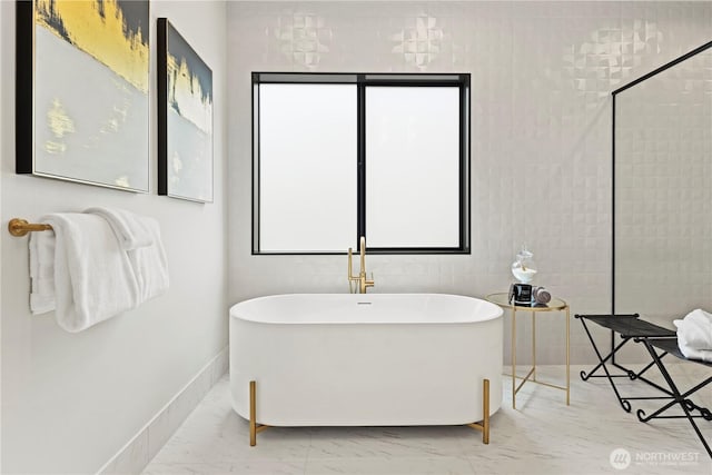 5515 108th Ave NE, Kirkland, WA 98033 - full bath with a freestanding tub and marble look tile flooring