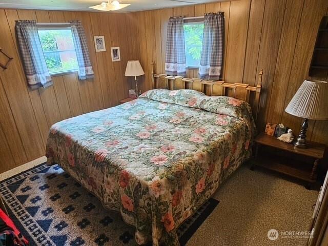 3906 L Pl, Seaview, WA 98644 - bedroom with multiple windows and wooden walls
