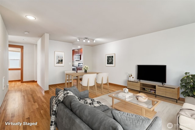 9211 Ashworth Ave N Unit B, Seattle, WA 98103 - living area with light wood-style floors and recessed lighting