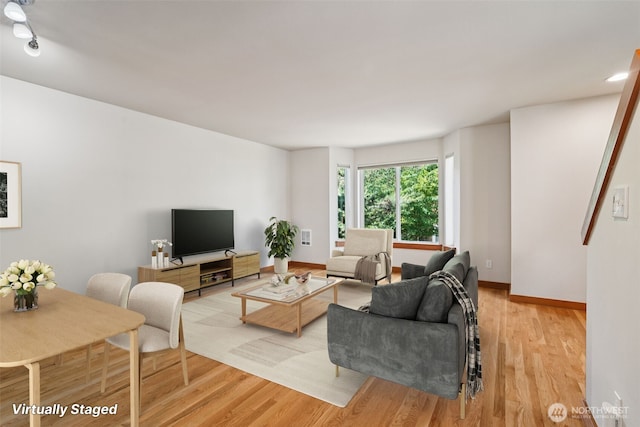 9211 Ashworth Ave N Unit B, Seattle, WA 98103 - living area featuring light wood-style floors and baseboards