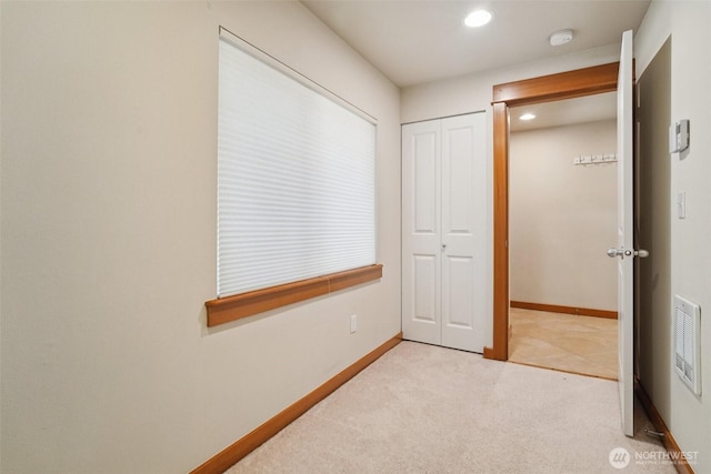 9211 Ashworth Ave N Unit B, Seattle, WA 98103 - unfurnished bedroom with light colored carpet, recessed lighting, and a closet
