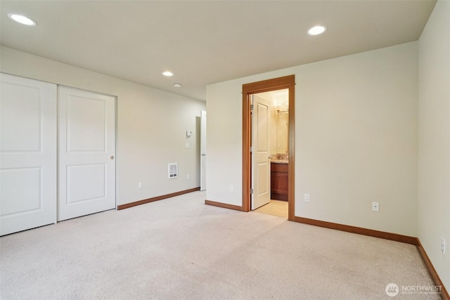 9211 Ashworth Ave N Unit B, Seattle, WA 98103 - unfurnished bedroom with light carpet, recessed lighting, a closet, and connected bathroom