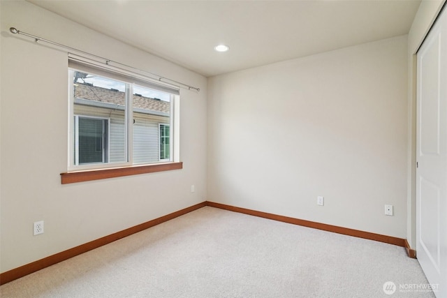 9211 Ashworth Ave N Unit B, Seattle, WA 98103 - unfurnished room with light colored carpet and recessed lighting