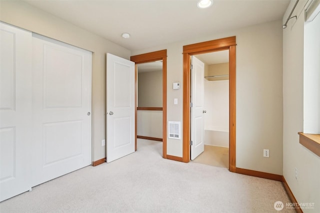 9211 Ashworth Ave N Unit B, Seattle, WA 98103 - unfurnished bedroom featuring light carpet, recessed lighting, and a closet