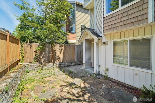 9211 Ashworth Ave N Unit B, Seattle, WA 98103 - fenced backyard featuring a patio
