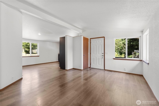 12407 Prairie Ridge Dr E, Bonney Lake, WA 98391 - spare room featuring wood finished floors