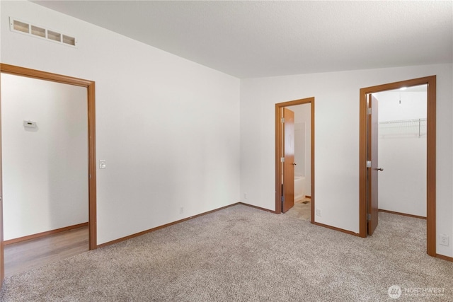 12407 Prairie Ridge Dr E, Bonney Lake, WA 98391 - carpeted empty room with baseboards