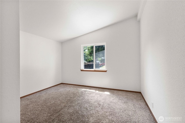 12407 Prairie Ridge Dr E, Bonney Lake, WA 98391 - carpeted empty room with vaulted ceiling and baseboards