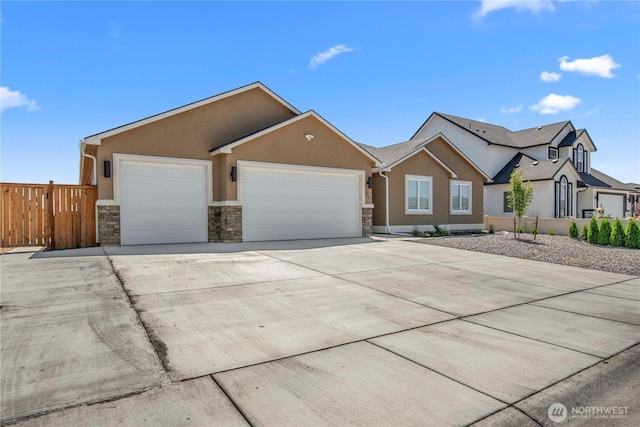 832 Q St SW, Quincy, WA 98848 - ranch-style house with stucco siding, stone siding, an attached garage, and concrete driveway