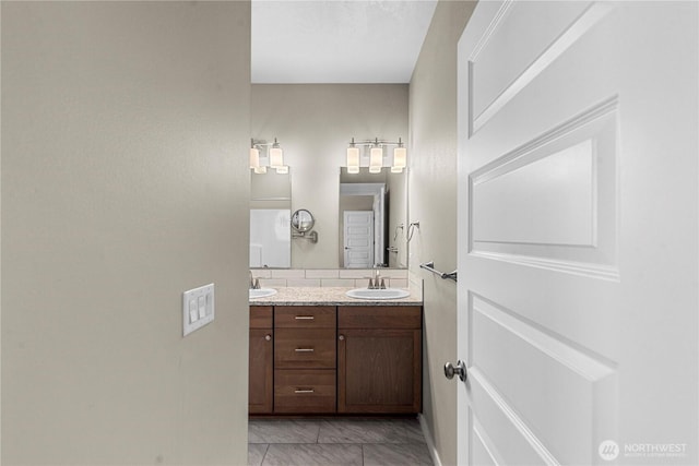 832 Q St SW, Quincy, WA 98848 - bathroom featuring double vanity and baseboards