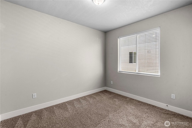 832 Q St SW, Quincy, WA 98848 - spare room featuring carpet flooring