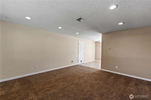 1315 Gaspar St, Wenatchee, WA 98801 - carpeted spare room with a textured ceiling and recessed lighting