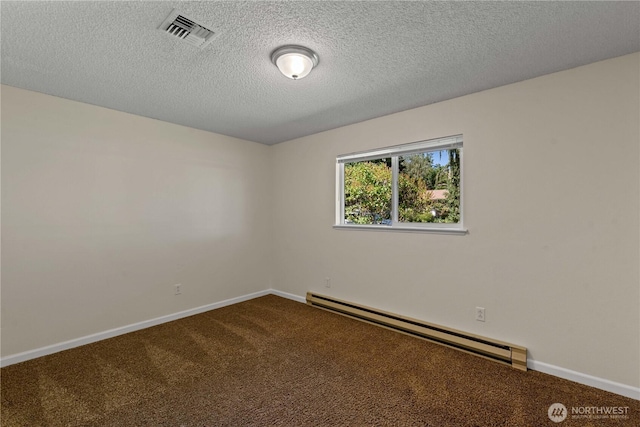 1315 Gaspar St, Wenatchee, WA 98801 - empty room with a baseboard radiator, dark carpet, and a textured ceiling