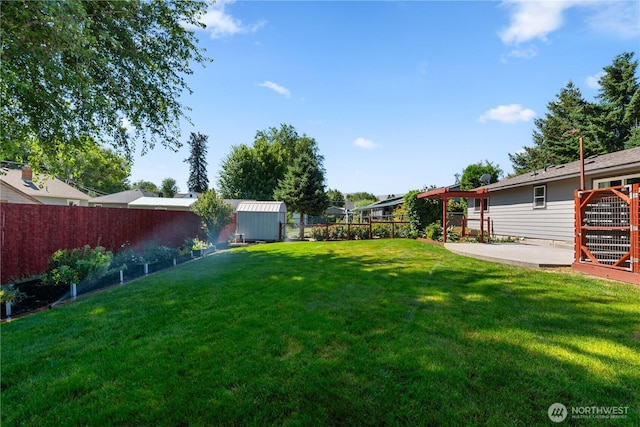 1315 Gaspar St, Wenatchee, WA 98801 - fenced backyard with a patio area and a storage shed