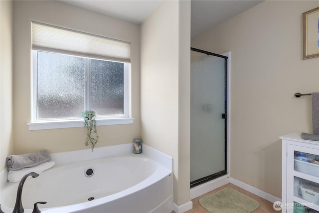 9321 179th Ln SW, Rochester, WA 98579 - full bathroom with a stall shower, healthy amount of natural light, and a garden tub