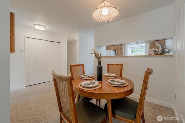 22703 Lakeview Dr Unit E5, Mountlake Terrace, WA 98043 - dining room with light colored carpet and baseboards