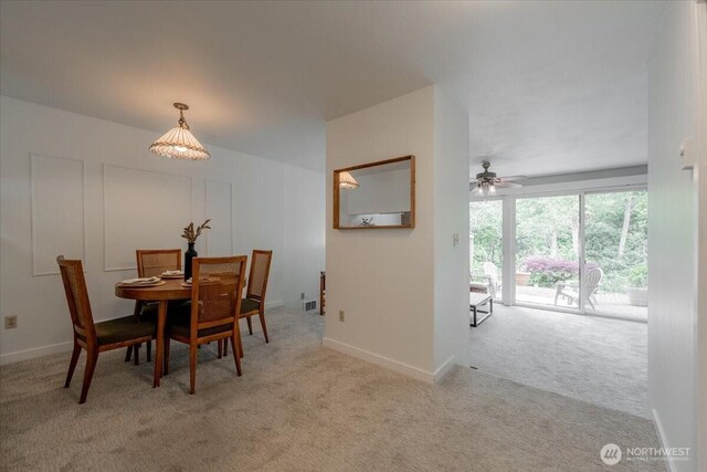 22703 Lakeview Dr Unit E5, Mountlake Terrace, WA 98043 - dining area with carpet and a ceiling fan