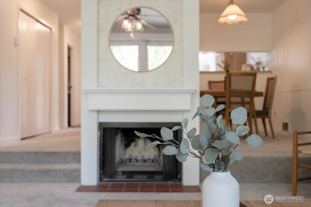 22703 Lakeview Dr Unit E5, Mountlake Terrace, WA 98043 - detailed view of carpet and a fireplace