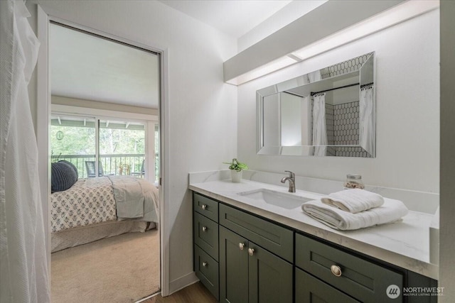 22703 Lakeview Dr Unit E5, Mountlake Terrace, WA 98043 - full bath with vanity, ensuite bath, and wood finished floors