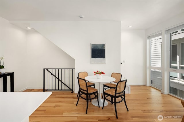 6042B 41st Ave SW, Seattle, WA 98136 - dining area featuring light wood finished floors, recessed lighting, and plenty of natural light