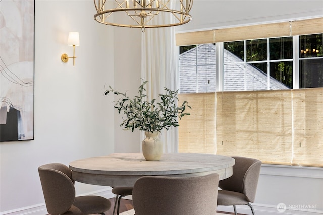 10909 Avondale Rd NE Unit L145, Redmond, WA 98052 - dining space featuring baseboards and a chandelier