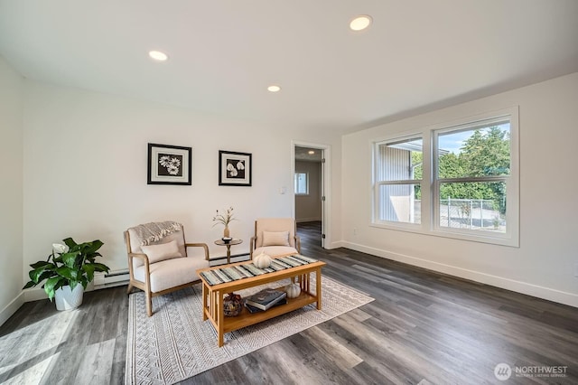 10985 SE 225th St, Kent, WA 98031 - sitting room featuring a baseboard heating unit, dark wood-style floors, baseboard heating, and recessed lighting