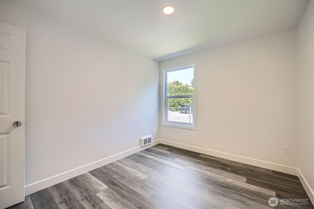 10985 SE 225th St, Kent, WA 98031 - spare room featuring dark wood-style floors and recessed lighting