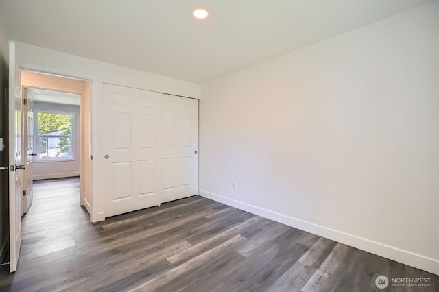 10985 SE 225th St, Kent, WA 98031 - unfurnished bedroom featuring dark wood-type flooring, recessed lighting, and a closet
