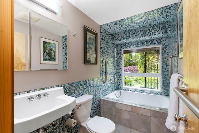 1201 Wilson St, Port Townsend, WA 98368 - full bath featuring tile walls and tiled shower / bath combo