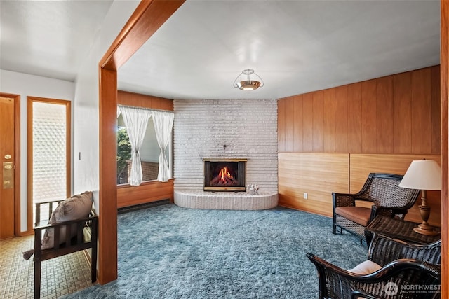 386 Mocliff Rd, Ephrata, WA 98823 - living area with a fireplace, carpet floors, and wooden walls