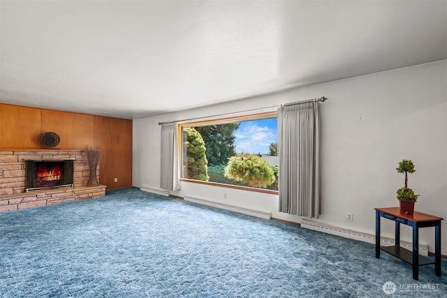 386 Mocliff Rd, Ephrata, WA 98823 - unfurnished living room featuring a baseboard radiator, a fireplace, and carpet flooring