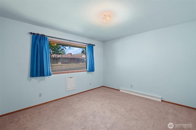 386 Mocliff Rd, Ephrata, WA 98823 - carpeted spare room featuring a baseboard radiator and baseboards