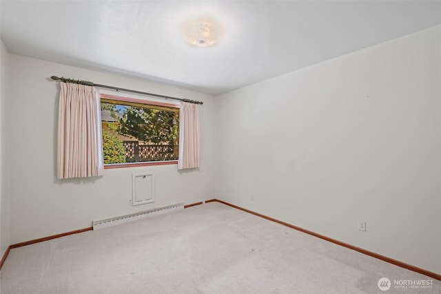 386 Mocliff Rd, Ephrata, WA 98823 - carpeted empty room featuring baseboard heating and baseboards