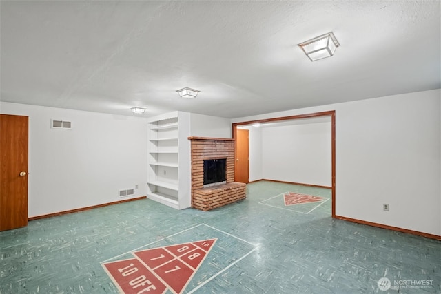 386 Mocliff Rd, Ephrata, WA 98823 - unfurnished living room featuring a fireplace and built in features