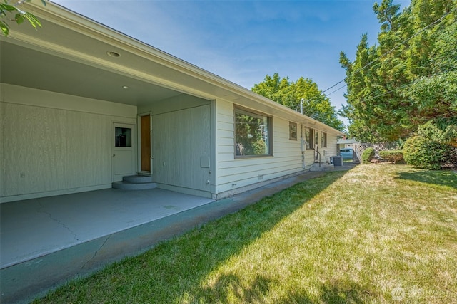 386 Mocliff Rd, Ephrata, WA 98823 - view of side of home with a lawn and a patio area