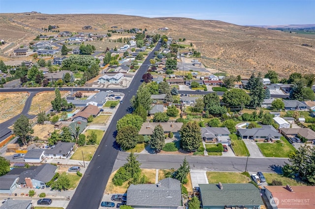 386 Mocliff Rd, Ephrata, WA 98823 - aerial overview of property's location with nearby suburban area and mountains