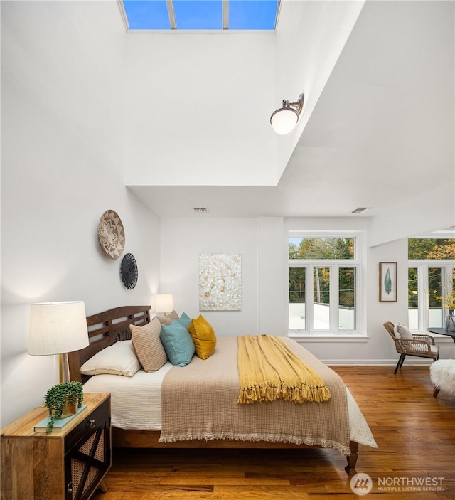 28091/2 Mount Rainier Dr S Unit 3, Seattle, WA 98144 - bedroom with wood finished floors and baseboards