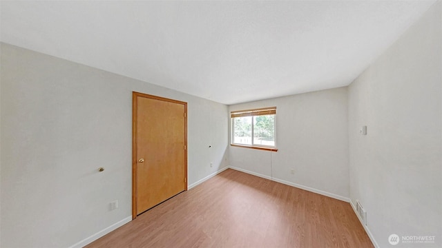 24250 164th Ave SE, Kent, WA 98042 - empty room with light wood-type flooring