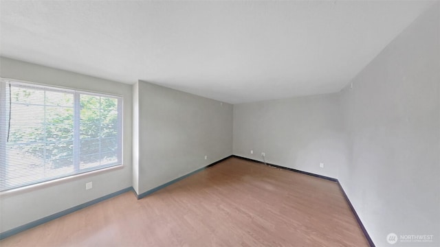 24250 164th Ave SE, Kent, WA 98042 - bonus room featuring wood finished floors and baseboards