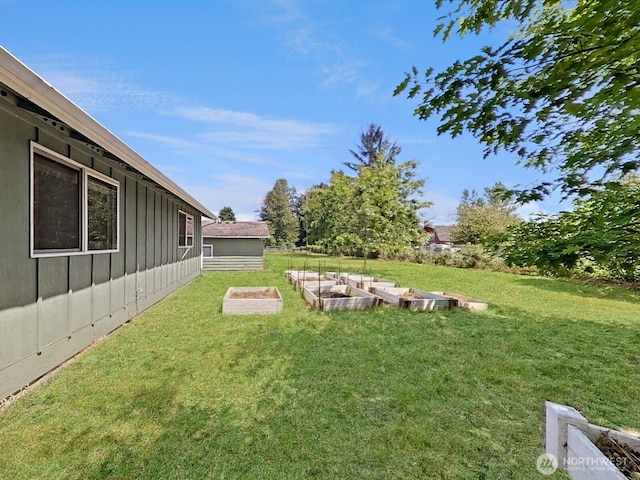 24250 164th Ave SE, Kent, WA 98042 - view of green lawn featuring a garden