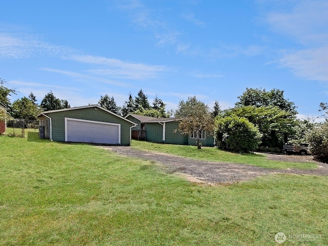 24250 164th Ave SE, Kent, WA 98042 - view of front facade featuring a detached garage, an outdoor structure, and driveway