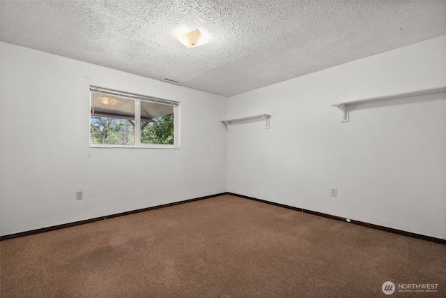 12012 County Line Rd E, Edgewood, WA 98372 - carpeted spare room with a textured ceiling and baseboards