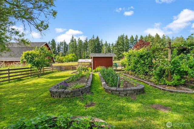 12012 County Line Rd E, Edgewood, WA 98372 - view of yard with a vegetable garden and an outdoor structure
