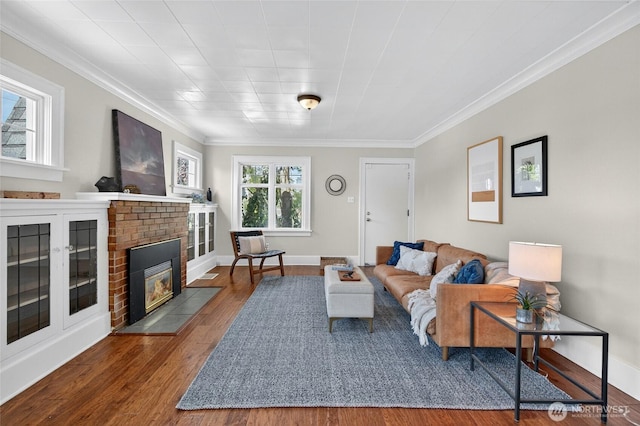 2318 F St, Bellingham, WA 98225 - living room with wood finished floors, ornamental molding, and a brick fireplace