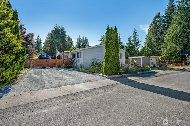 24442 Wicker Rd Unit 37, Sedro Woolley, WA 98284 - view of side of home with a storage unit