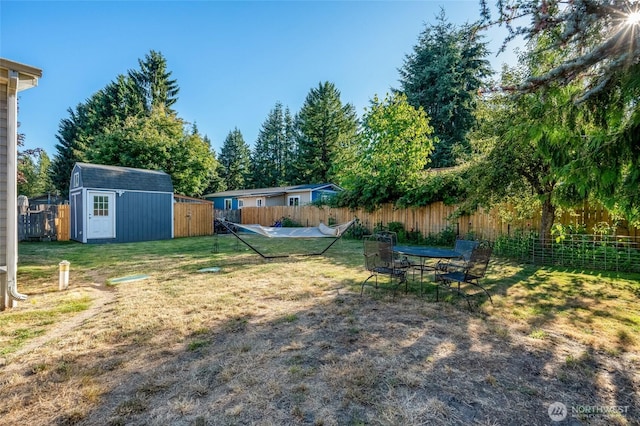 24442 Wicker Rd Unit 37, Sedro Woolley, WA 98284 - fenced backyard with a storage shed