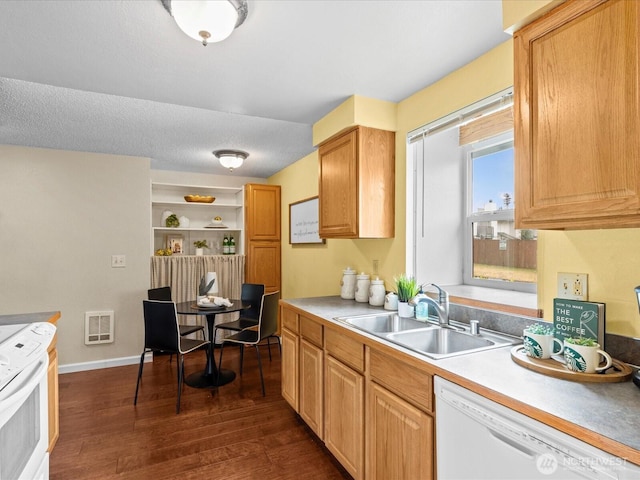 4811 76th St NE Unit 5, Marysville, WA 98270 - kitchen featuring white appliances, dark wood-style flooring, light countertops, and heating unit