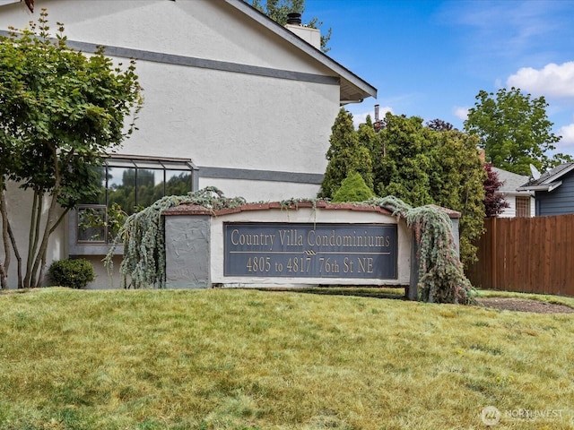 4811 76th St NE Unit 5, Marysville, WA 98270 - view of home's exterior featuring stucco siding and a chimney