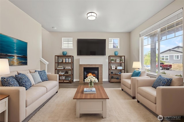 329 Holland Ave, Bellingham, WA 98226 - living area with a tiled fireplace and light wood-style floors